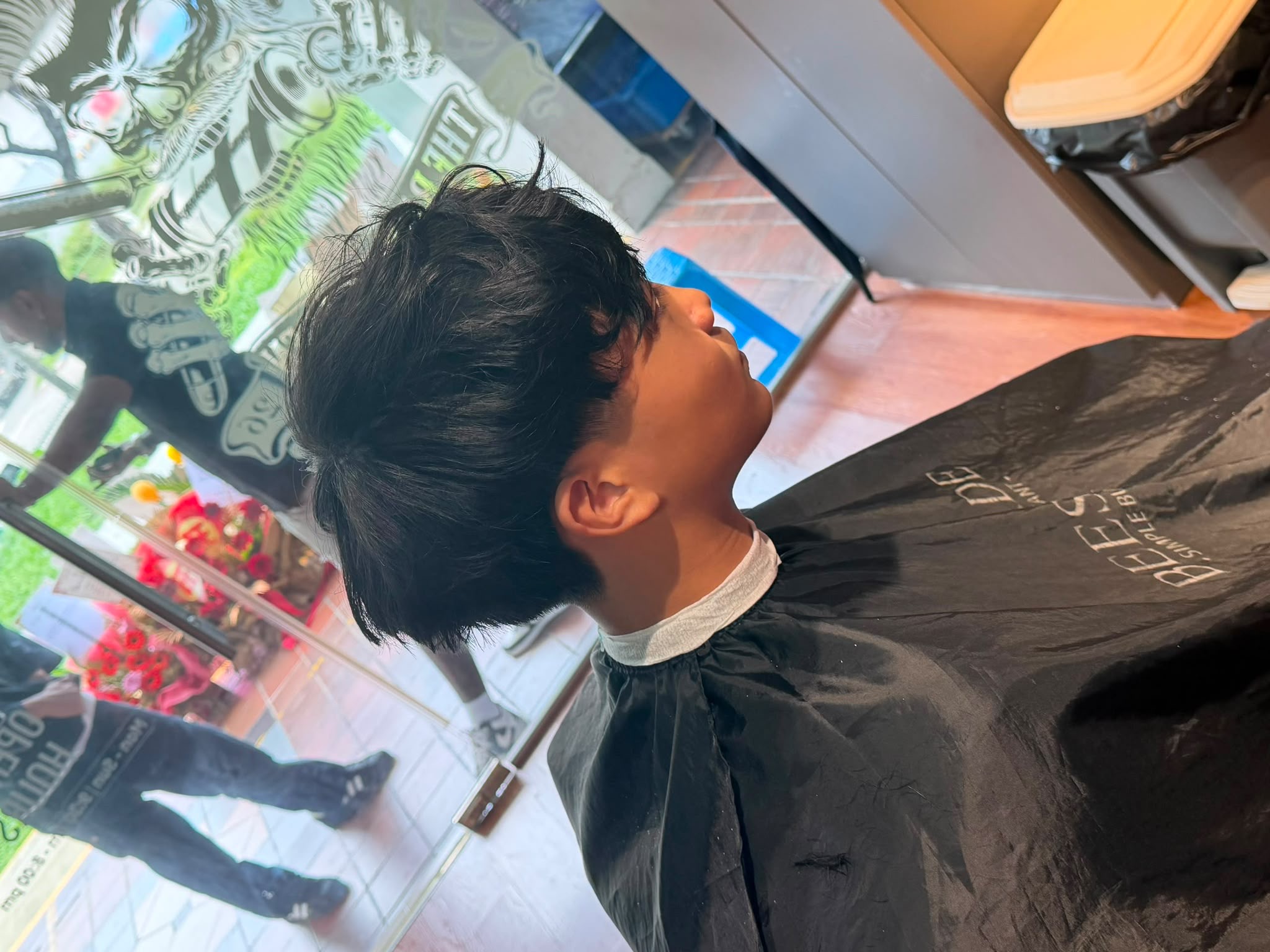 Finished layered haircut at The Barber'Z Den